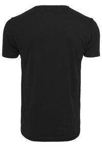 Svart bomull T-skjorte med klassisk rund hals, korte ermer og en plain bakside uten grafikk eller ekstra detaljer.