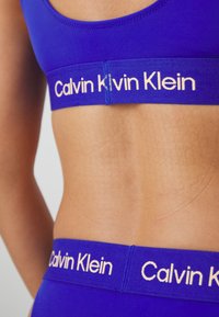 Calvin Klein Swimwear CHEEKY - Donji dijelovi bikinija - midnight lagoon