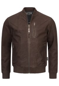Braune LederBomberjacke mit Reißverschluss vorne, gerippten Bündchen und zwei seitlichen Reißverschlusstaschen. Verfügt über eine Brusttasche mit Reißverschluss.