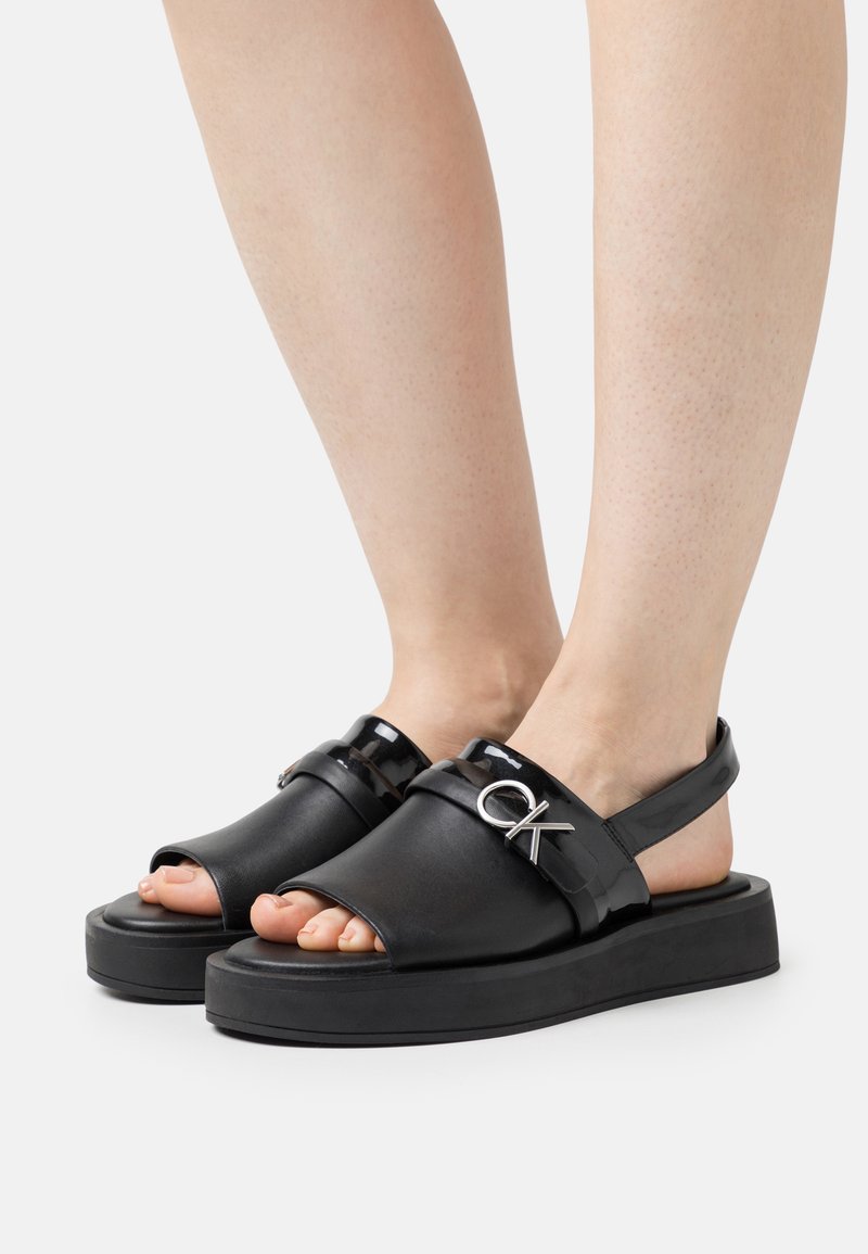 Calvin Klein DRESS - Sandalen met plateauzool - black/zwart - Zalando.nl