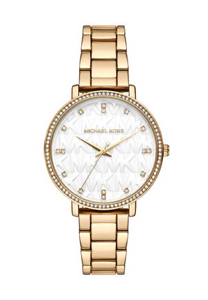 Michael Kors armbåndsur i guldfarve med krystalbesat ramme, hvid urskive præget med "MK" mønster og krystal timeindikatorer.