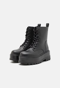 Calvin Klein Jeans FLATFORM HIGH LACE UP - Botines con cordones - triple black