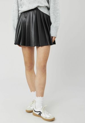 EN ENDUIT - Jupe trapèze - noir