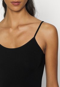 MAGIC Bodyfashion CAMI - Camisola interior - black