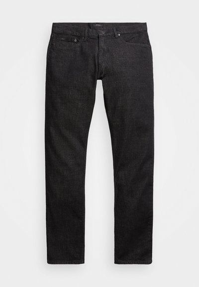 Μαύρα τζιν παντελόνια με στενή γραμμή, πεντατσέπη σχεδίαση και διακριτές ραφές. Το υλικό είναι ανθεκτικό και έχει λεία υφή.