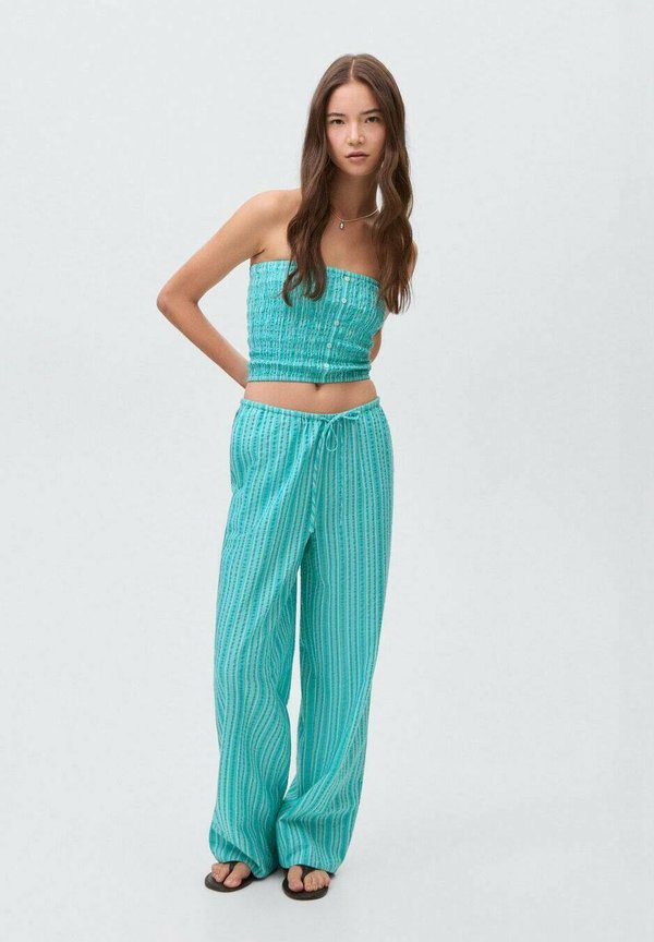 PRUHOVANÉ S VÁZAČKOU - Trousers - turquoise