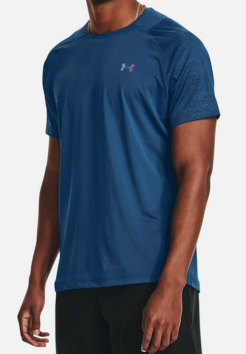 Short-sleeve athletic shirt in deep blue, featuring a subtle textured pattern and a multicolored logo on the chest. Smooth fabric.