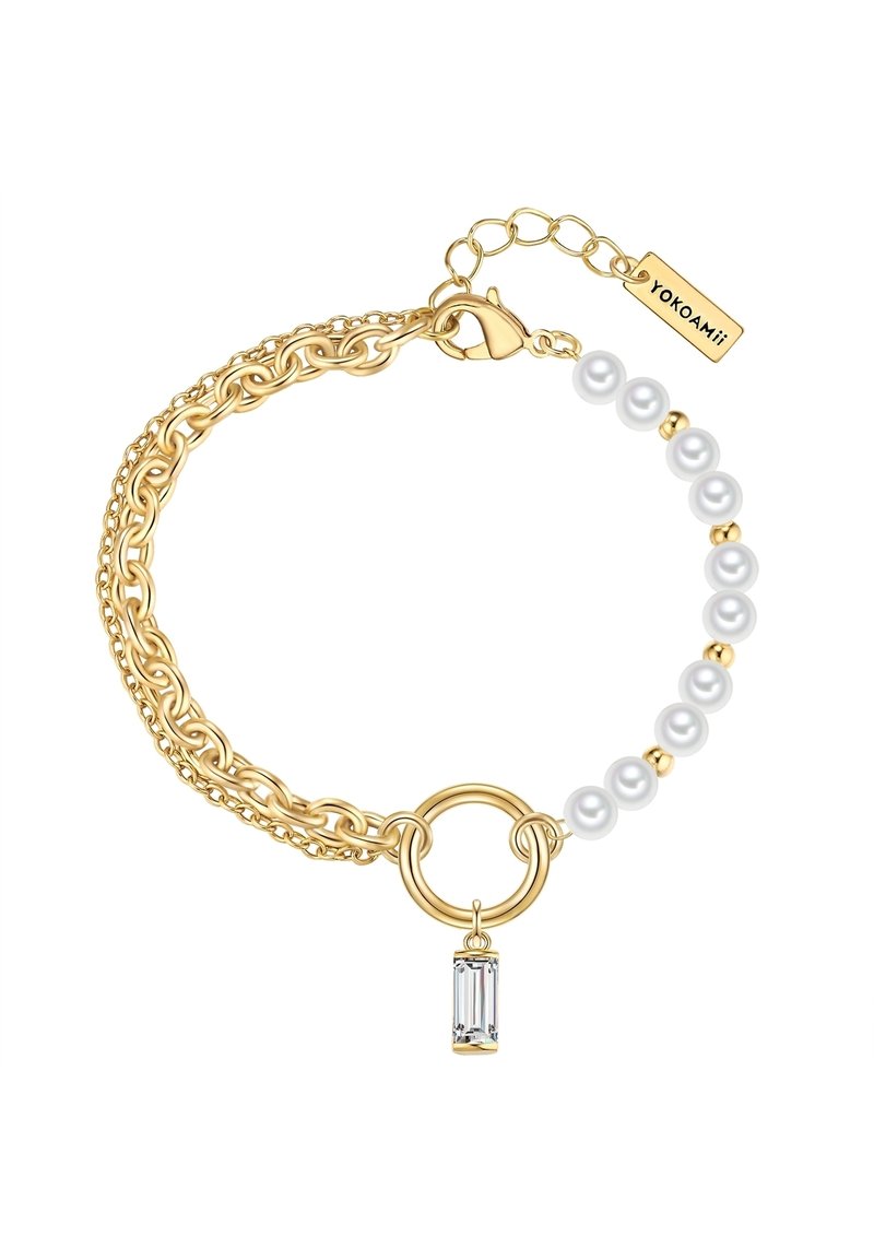 Auksinė grandinėlė su didelėmis nuorodomis ir mažomis perlamutrinėmis karoliukais, su centrinėmis žiedu ir skaidriu stačiakampiu žavesiu.