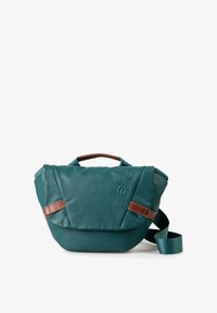 Unselected, transformative teal