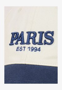 Valimata, cream and navy