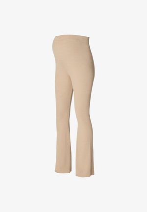 Beige ribbed flared leggings with a soft, stretchy waistband, designed for comfort and a fitted silhouette through the legs.