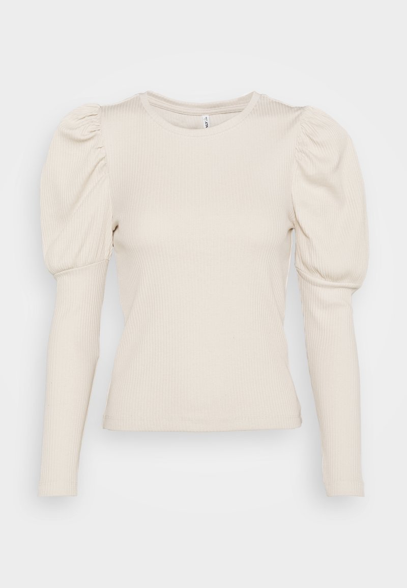 Haut à manches longues en tissu côtelé blanc cassé. Caractéristiques : épaules bouffantes et coupe ajustée. Encolure arrondie avec des détails de couture subtils.