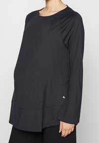 Puma Langarmshirt - black