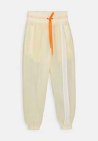 Helle gelbe Jogginghose mit elastischem Bund, orangefarbenem Kordelzug, weißen Seitenstreifen und gerafften Bündchen. Glattes, leichtes Material.