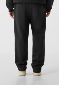 Lost Youth CORE COMFORT - Spodnji deli trenirk - black