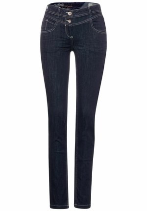 Ciemnoniebieskie jeansy slim fit z podwójnym zapięciem na guziki, przednimi kieszeniami i białym przeszyciem na białym tle.