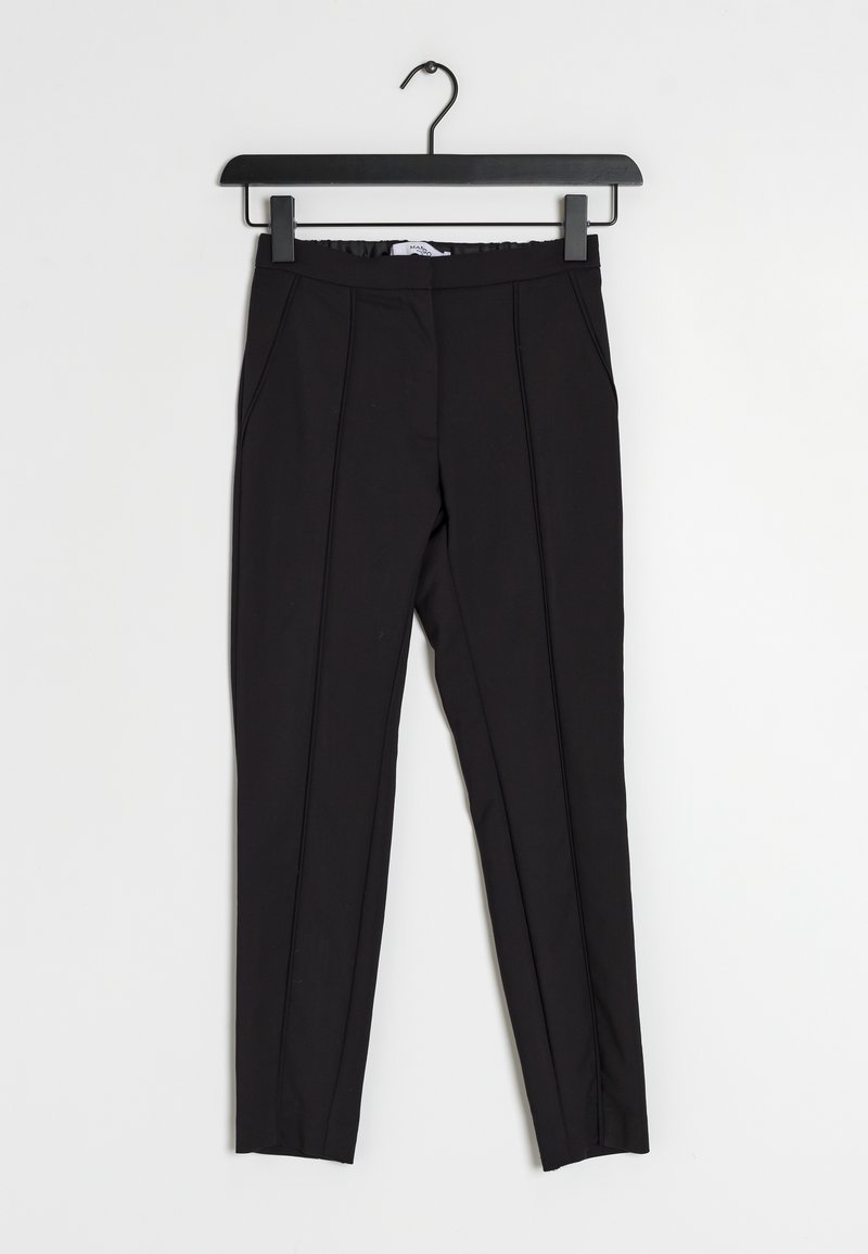 Pantalons noirs en tissu extensible, avec une coupe ajustée, une taille élastique, des coutures verticales et une silhouette de jambe fuselée.