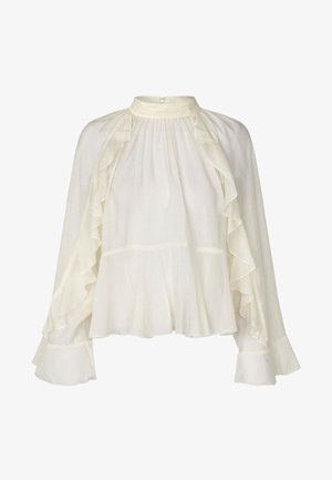 Hvid bluse med høj hals, flæser foran og på ærmerne samt løs pasform. Letvægtsstof med tekstur, som falder flydende og har et lagdelt design.