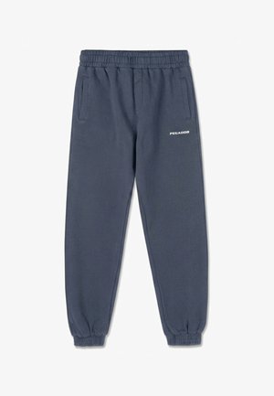 Pantaloni jogger blu navy con vita elasticizzata, polsini alle caviglie, tasche laterali e piccolo logo bianco "PEGADOR" sulla coscia destra.