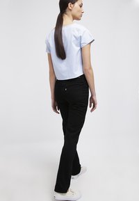 Levi's® CLASSIC DEMI STRAIGHT - Straight leg jeans - pitch black