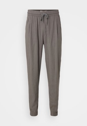 Joggers de lino gris con cintura elástica, cordón ajustable y puños fruncidos. Presenta bolsillos laterales y un ajuste relajado.