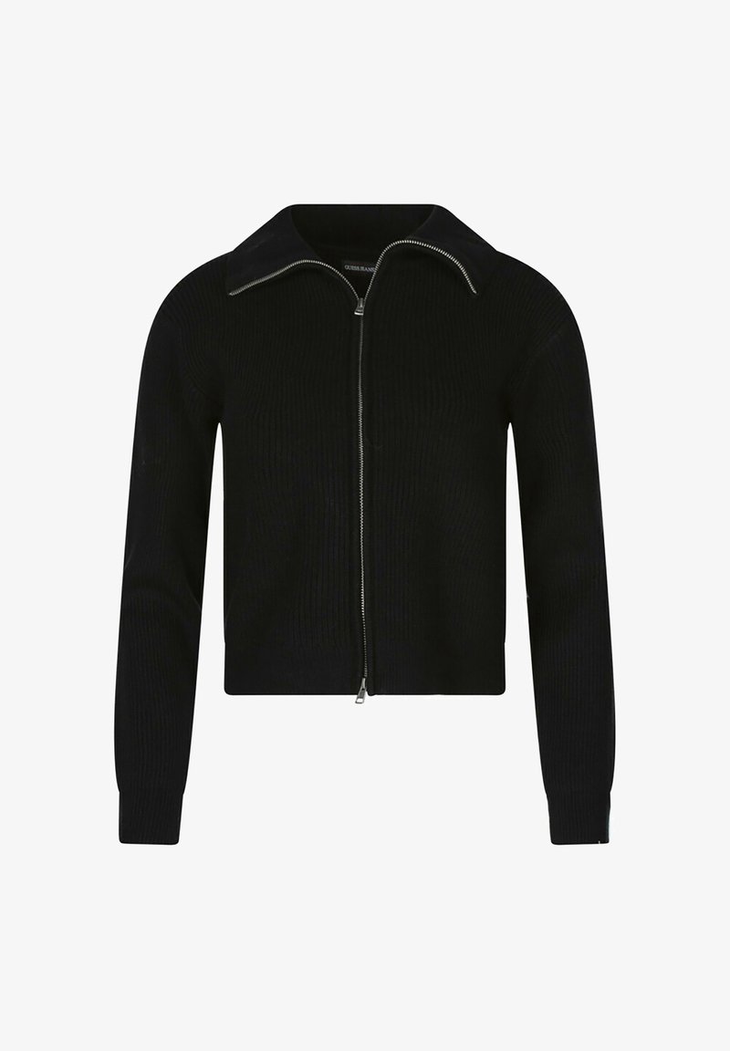 Felpa nera cropped con zip, realizzata in tessuto a costine, dotata di colletto e maniche lunghe. Il dettaglio della zip argentata completa il design.