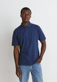 BOSS DYE - Polo majica - open blue