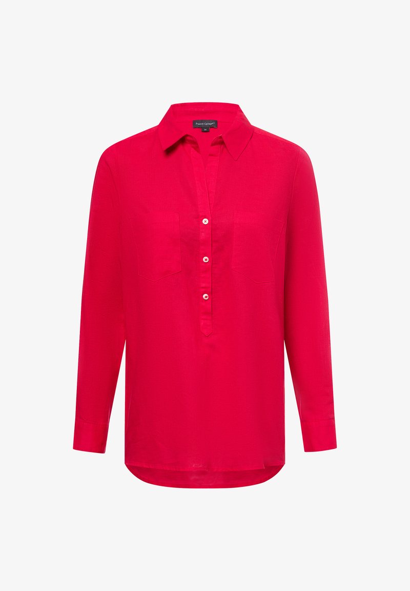 Langärmliges, leuchtend pinkes Shirt mit kragenlosem Ausschnitt, vorderem Knopfverschluss, zwei Brusttaschen und abgerundetem Saum. Glatte Textur.