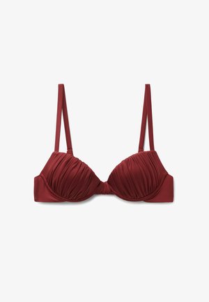 Bordeauxroter gepolsterter BH mit Raffung, verstellbaren Trägern und einem glatten Stofffinish. Weiche Textur und strukturierte Form.