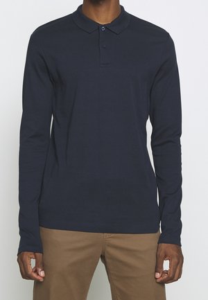 Polo a maniche lunghe navy in cotone, con colletto classico, patta con tre bottoni e dettagli di cucitura sottili.
