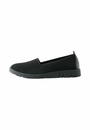Zapato negro sin cordones con parte superior de malla transpirable, suela flexible y tira en el talón, diseñado para un uso casual.