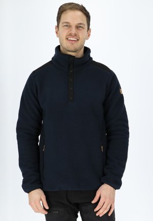 Navy fleece pullover with high collar, button placket, black shoulder accents, and side pockets. Soft texture and warm design.