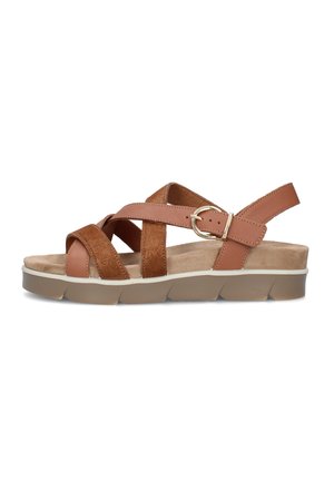 Sandalo da donna in pelle e camoscio marrone con cinturini incrociati, fibbia dorata, sottopiede imbottito beige e suola spessa in gomma color cuoio.