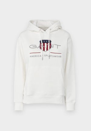 Valge puuvillane kapuutsiga särk, millel on ees nurgakotike, reguleeritavad paelad ja punane, sinine ja hall graafiline logo.