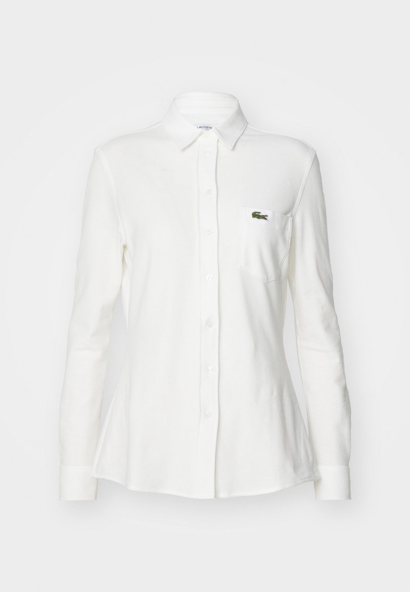 Lacoste Overhemdblouse crème Lacoste Overhemdblouse crème