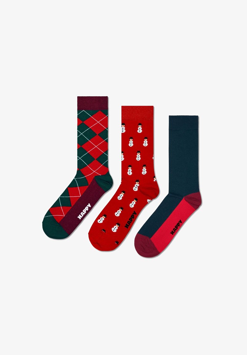 Three pairs of socks: one with green and red argyle, one with red snowmen, and one solid dark teal with a pink toe. All have "HAPPY" logo.