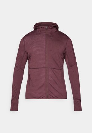 Maroon zip-up hoodie with a textured pattern, long sleeves, and a fitted design. Features a high collar and a discreet zippered pocket.
