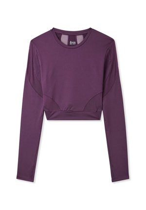 Cropowana bluzka z długim rękawem w głębokim fioletowym kolorze, wykonana z gładkiego materiału, z siateczkowymi akcentami i okrągłym dekoltem.