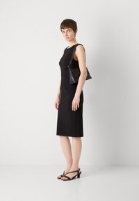 MARCIANO BY GUESS ZIP MIDI DRESS - Trikoomekko - black