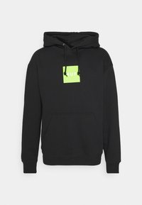 Felpa nera con cappuccio in cotone, con cordino, tasca frontale e un logo quadrato verde neon con la scritta "HUF" in bianco.