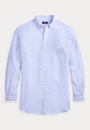 Light blue button-up shirt with white vertical stripes, long sleeves, pointed collar, and a left chest pocket featuring a small yellow logo.