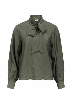 Chemisier vert olive en tissu texturé, avec un nœud au niveau du col, des manches longues et une coupe décontractée.
