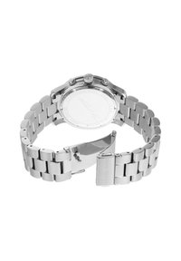 Edelstahl-Uhr mit einem polierten silbernen Gliederarmband, runder Gehäuseform, drei Drückern und einem minimalistischen weißen Ziffernblatt ohne Markierungen.