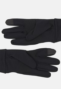 Guantes negros de tela elástica con revestimiento texturizado en las palmas y las yemas de los dedos. Diseño elegante con un ajuste ceñido, adecuado para uso al aire libre.