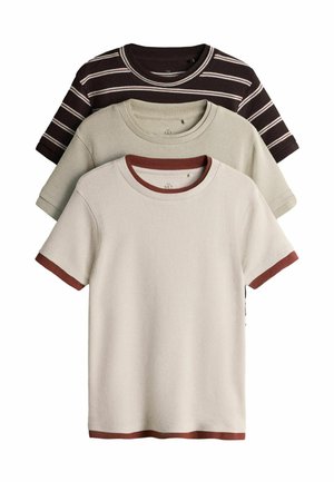 Three short-sleeve crew neck t-shirts stacked, one beige with brown trim, one solid light olive, one dark brown with white stripes.