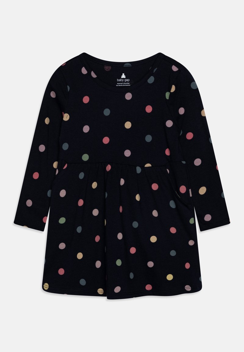 Robe noire à manches longues pour tout-petit avec des pois multicolores et une taille froncée, fabriquée en tissu doux.