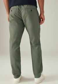 Next SLIM FIT zielony