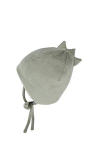 Green ribbed fabric hat with a pointed top and two small triangular accents, secured with tied straps at the base. Soft texture.