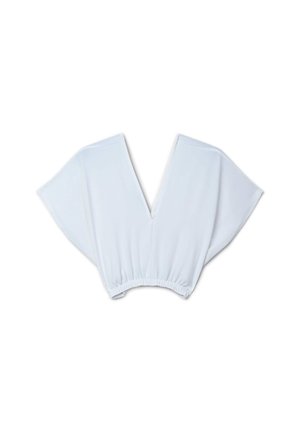 Haut en tissu blanc avec un décolleté en V profond et de larges manches fluides. Le bas est doté d'une taille élastique pour un ajustement confortable.