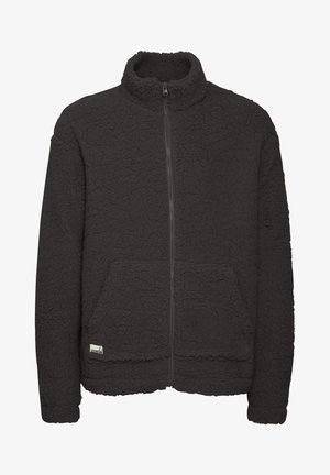 Čierna fleecová bunda so zipsom, vysokým golierom, textúrovaným povrchom, dvoma prednými vreckami a malou nášivkou na dolnej ľavej strane.